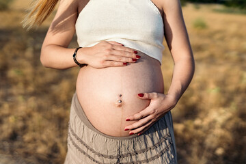 Faceless Pregnant Young Woman Portrait
