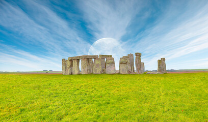 Panoramic view of Stonehenge at cloudy sky with full moon - United Kingdom "Elements of this image furnished by NASA"