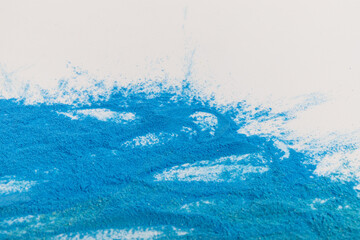 Fototapeta na wymiar Blue background from holi powder paint. Celebrate the Holi festival.