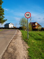 Speed limit traffic sign up to 50 on the road