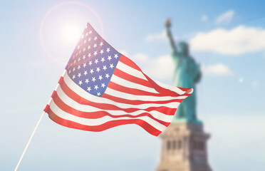 American flag on blurred statue of liberty background for Memorial Day, 4th of July, Labour Day,...