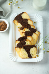 Homemade vanilla chocolate marbled cake on a plate