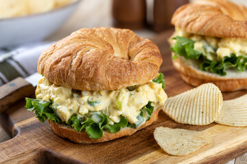 Egg salad sandwich on a croissant