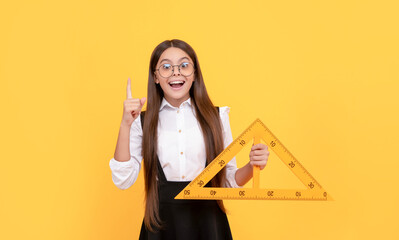 inspired with idea teen girl hold triangle. back to school. algebra and geometry.