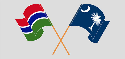 Crossed and waving flags of the Gambia and The State of South Carolina