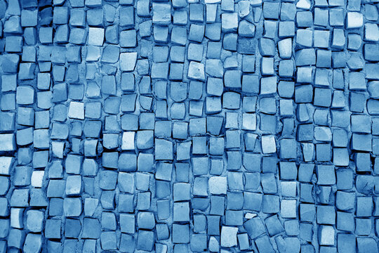 Color mosaic wall texture in navy blue color.