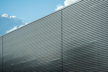 Fototapeta na wymiar Warehouse wall metal texture surface in industrial estate in england, uk