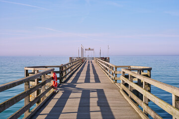 Historic seaside resort Heiligendamm, Bad Doberan in Mecklenburg-Vorpommern, Germany. Pier at the Baltic Sea. 