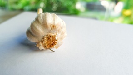 Garlic on white background with natural bokeh, Garlic is an Asian food ingredient and herbal food