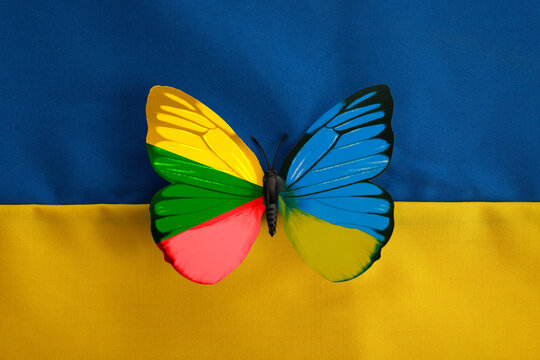 Lithuania Ukraine flag colors butterflay. Pray for Ukraine. Ukraine and Lithuania as a symbol of support and patriotism