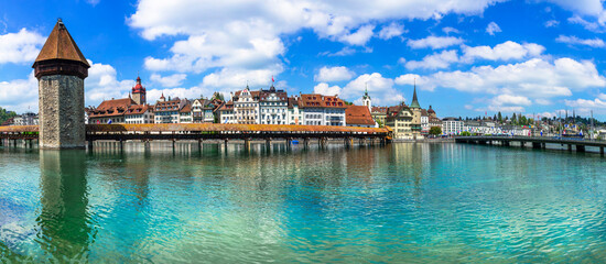 Panoramic view of Lucerne (Luzern) town with famous Chapel wooden bridge over Reuss river. ...