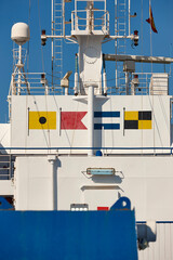 Nautical flags on a cruise ship. Navigation symbols. International alphabet