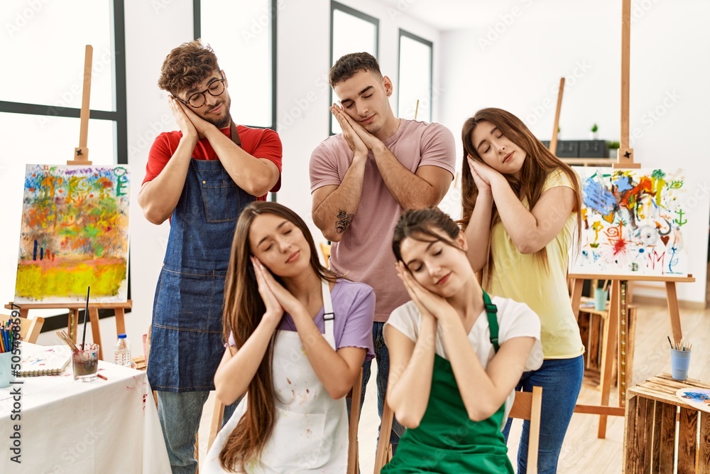 Canvas Prints Group of five hispanic artists at art studio sleeping tired dreaming and posing with hands together while smiling with closed eyes.