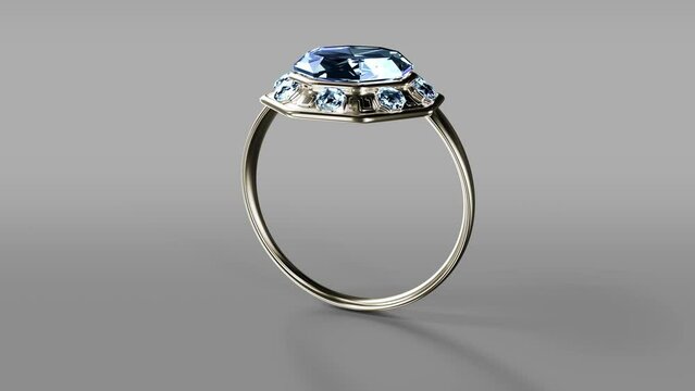 White gold wedding ring with blue diamond rotate on grey bg, fictional - loop video