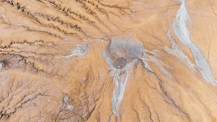 Top view of a geological formation under a sunny sky