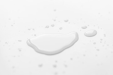 .Water spilled on a white table - Image