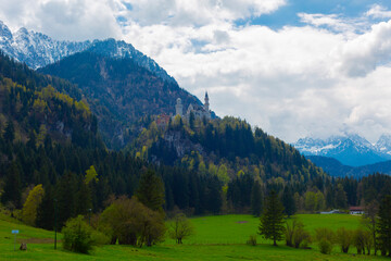 Beautiful view of world-famous Neuschwanstein Castle, the nineteenth-century Romanesque Revival...