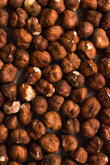 pile of raw hazelnut on white background