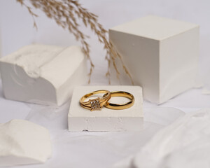 Wedding ring set on white stone. The jewelry ring is ready to be showcased and sold. The wedding...