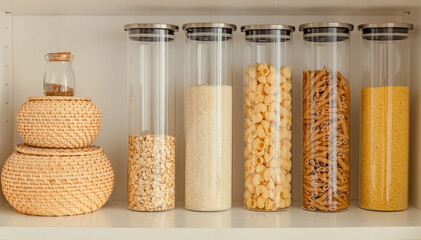 organization of food storage in the kitchen, transparent reusable jars for cereals and pasta, zero...
