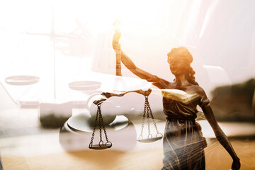 Justice and law concept.Male judge in a courtroom with the gavel, working with, computer and...