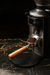 Coffee grinder machine grinding coffee - obrazy, fototapety, plakaty
