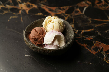 Ice cream scoop on marble table background