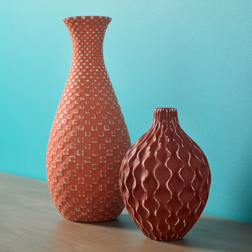 Vases on teal