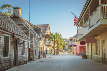Historic St Augustine Florida main street with oldest wooden school house, shops and cafes. - obrazy, fototapety, plakaty
