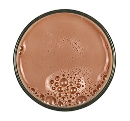 Chocolate milk puddle in glass isolated on white, top view