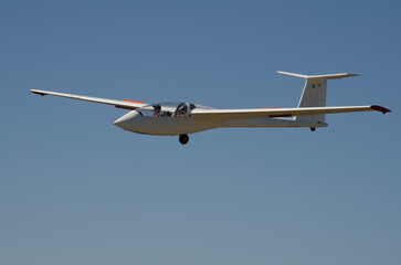 Fototapeta na wymiar ultralight glider with blue sky background
