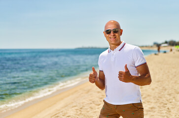 Happy man on the sea .Vacation by the sea.