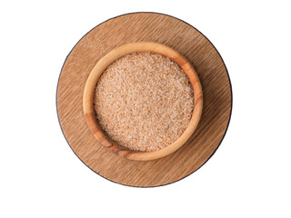 Psyllium husk in the plate on white background.