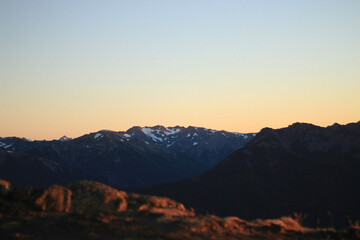Naklejka na ściany i meble sunset in the mountainsOlympic National Park 