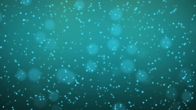 Green reigns supreme particles on dark blue background. Glitter particles with stars. Bokeh shiny particles seamless loop animation. Concept of birthday, holiday, celebration