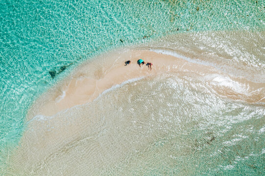 Aerial top view of the Caribbean Sea in the Goff's Caye island in Belize, Central America