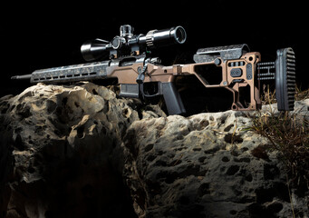 Rifle with a scope on a rock