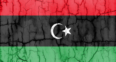 Textured photo of the flag of Libya with cracks.