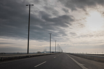 POV from a car driving through skane bridge, connecting link between copenhagen and malmo with a motorway.