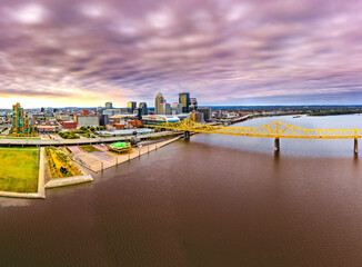 Mesmerizing drone shot of the Louisville, Kentucky on a stormy day with buildings and green spaces