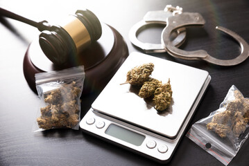 Drug package with hemp. Marijuana bags on scale