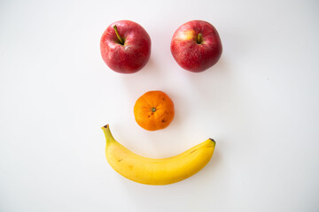 Happy smiley face made out of fruits