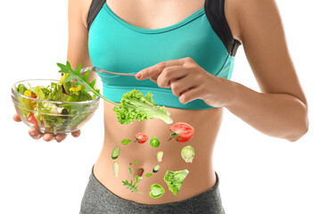 Sporty young woman with healthy vegetable salad on white background. Concept of diet