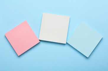 Different blank sticky notes on color background