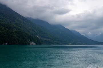 Beautiful view of Lake Brienz against the background of the Alps. Interlaken, Switzerland.