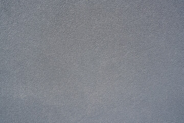 Rough texture of rendered wall, blue grey in colour. Suitable as background.