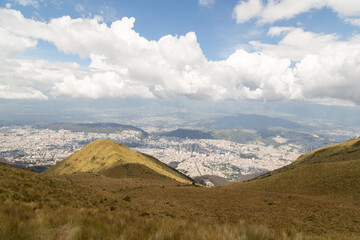 majestic landscape of a sunny day, modern structure of a city in Latin America, Quito-Ecuador, tourist place with natural meadow, architecture