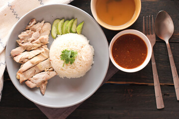 Hainanese chicken rice or rice steamed with chicken, soup