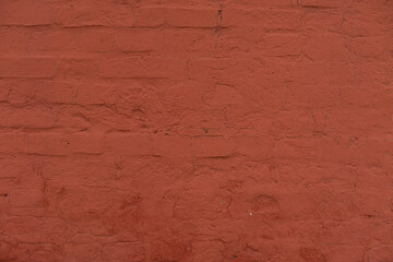Brick red wall. Background of a old brick house.