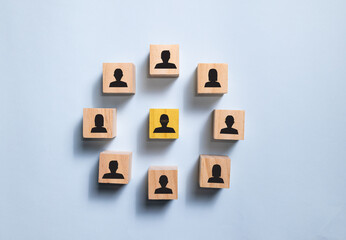 Top view wooden blocks with people icon set to circle. Concept for company and human resorce...